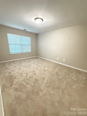 an empty room with a natural light