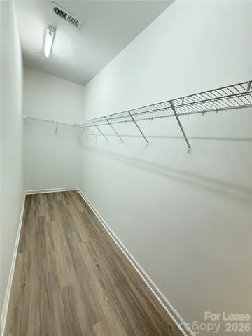 a view of a room with racks on the wall