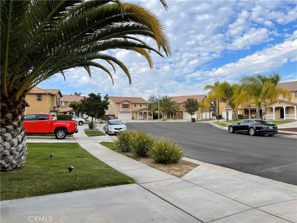 38017 Greenleaf Place Murrieta, CA 92562 - Photo 13 of 37 a view of a street with cars parked