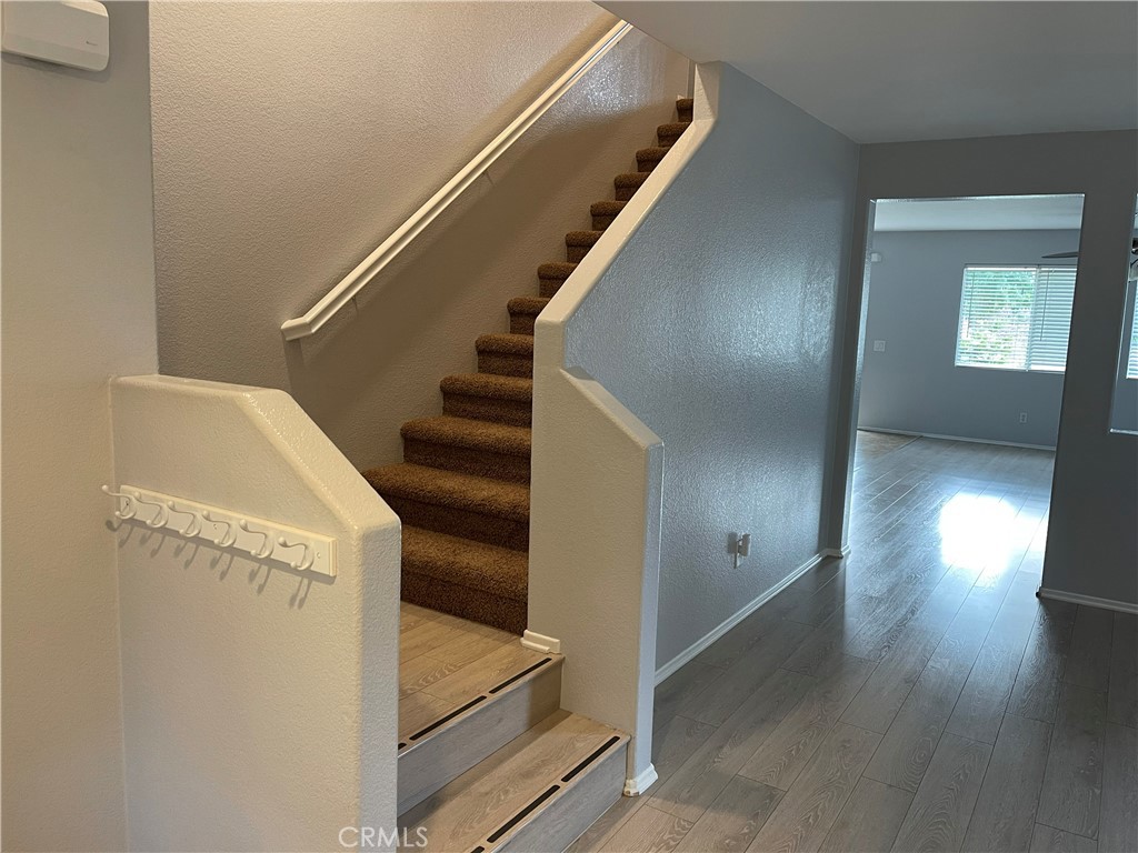 38017 Greenleaf Place Murrieta, CA 92562 - Photo 15 of 37 a view of entryway and hall with wooden floor