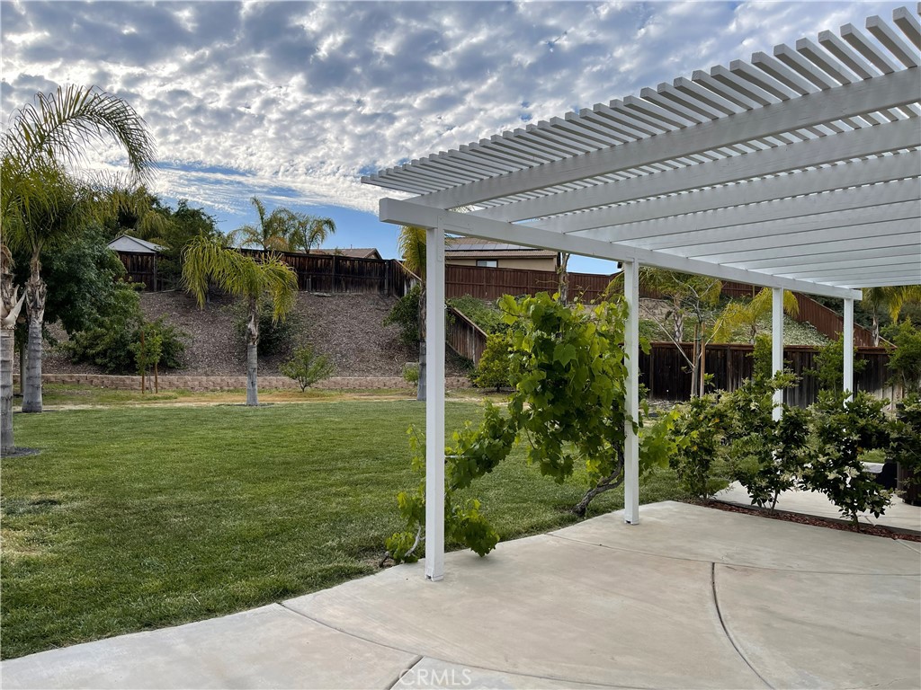 38017 Greenleaf Place Murrieta, CA 92562 - Photo 5 of 37 a backyard of a house with plants and outdoor seating