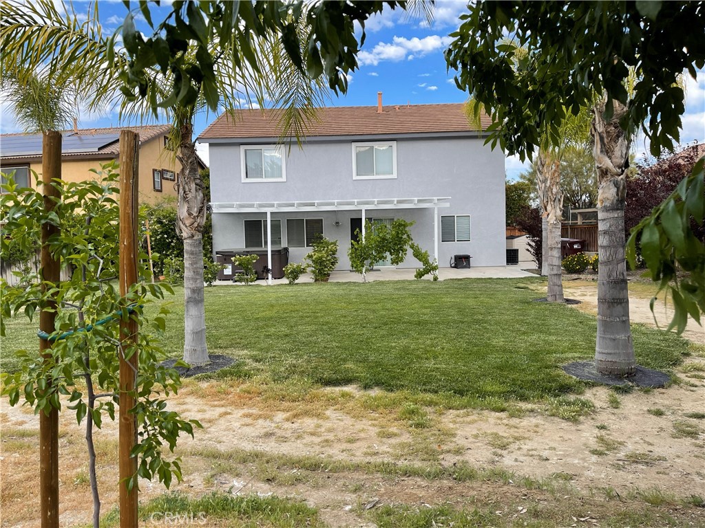 38017 Greenleaf Place Murrieta, CA 92562 - Photo 9 of 37 a front view of a house with a yard