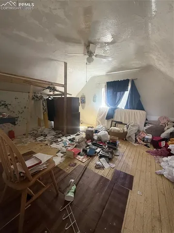 a living room with lots of furniture and a fireplace