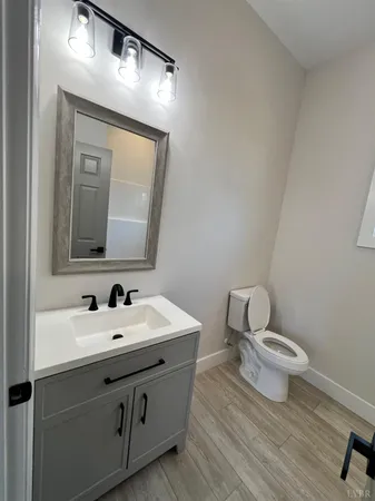 a bathroom with a toilet and a sink