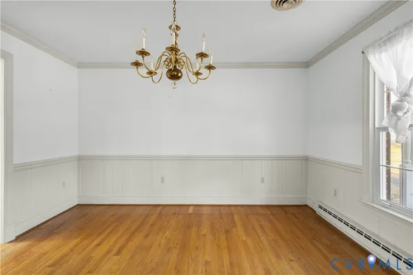 a view of a room with wooden walls