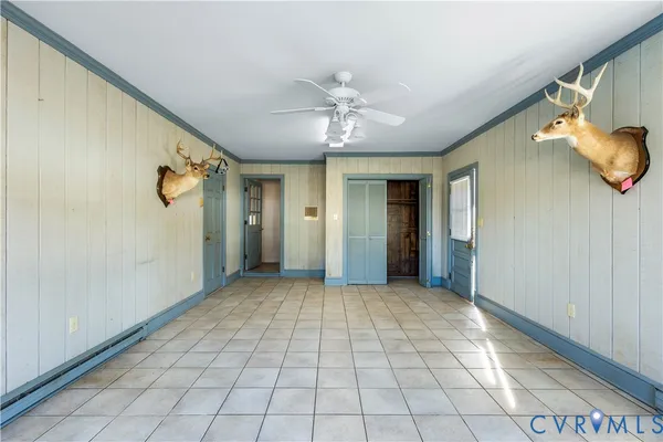 a bathroom with a toilet a sink and a window