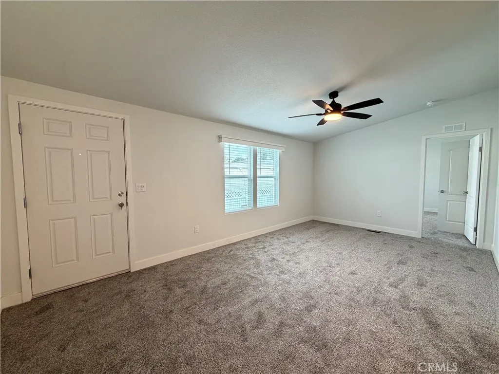 9080 Bloomfield Avenue, Unit 145 Cypress, CA 90630 - Photo 13 of 26 a view of an empty room with a window