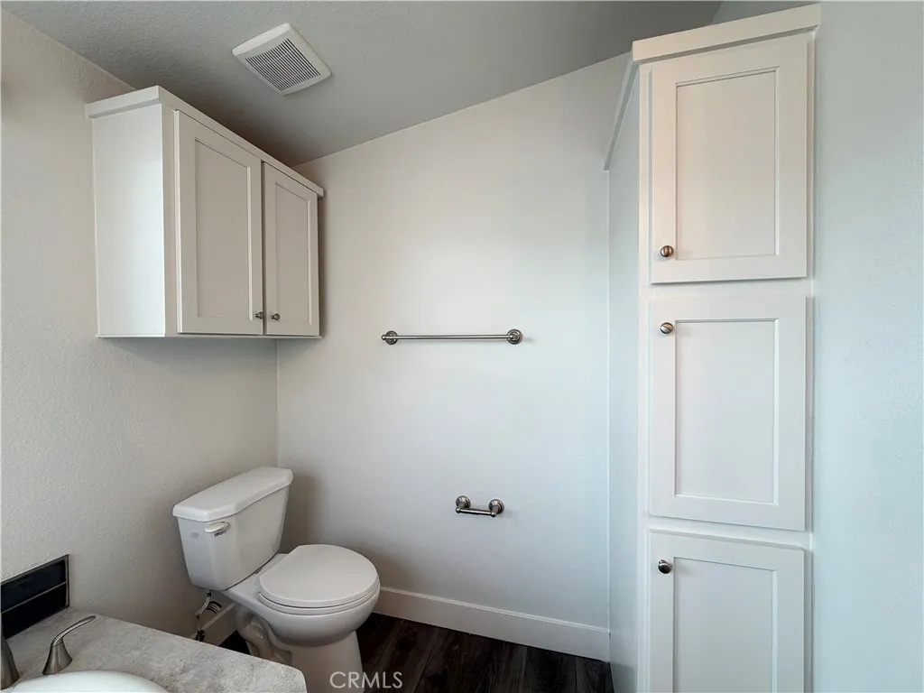 9080 Bloomfield Avenue, Unit 145 Cypress, CA 90630 - Photo 20 of 26 a bathroom with a toilet