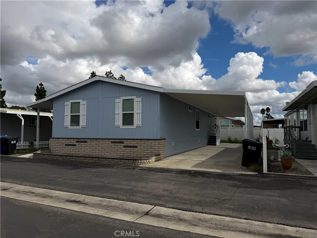 9080 Bloomfield Avenue, Unit 145 Cypress, CA 90630 - Photo 2 of 26 a view of a house with a street