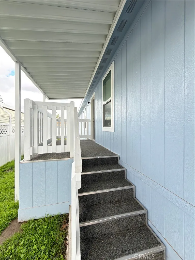 9080 Bloomfield Avenue, Unit 145 Cypress, CA 90630 - Photo 4 of 26 a view of entryway and hall with wooden floor