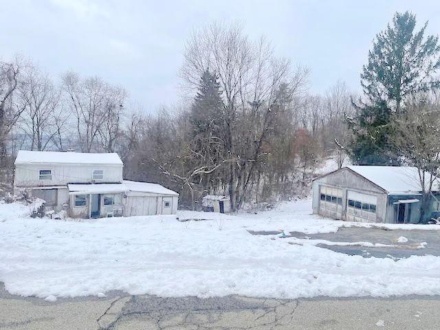 a view of house with trees in the background