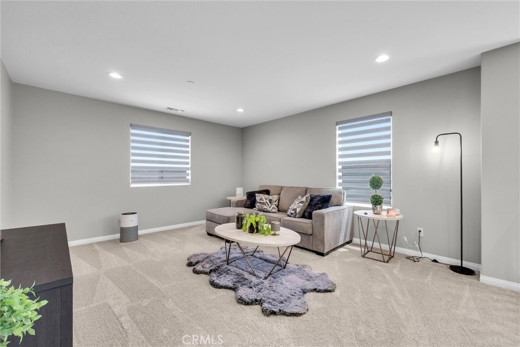 26538 San Jacinto Road Menifee, CA 92585 - Photo 16 of 34 a living room with furniture a window and a table