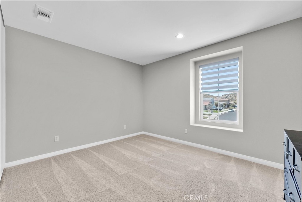 26538 San Jacinto Road Menifee, CA 92585 - Photo 19 of 34 a view of an empty room with a window