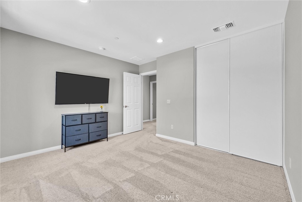 26538 San Jacinto Road Menifee, CA 92585 - Photo 20 of 34 a room with furniture and flat screen tv