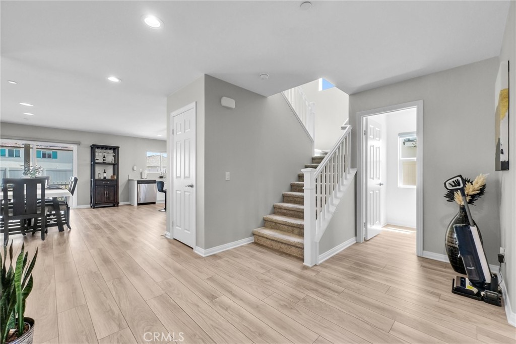 26538 San Jacinto Road Menifee, CA 92585 - Photo 4 of 34 a view of a room with wooden floor and stairs