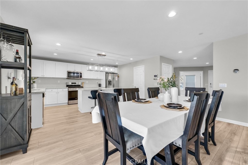 26538 San Jacinto Road Menifee, CA 92585 - Photo 8 of 34 a view of a dining room and livingroom with furniture
