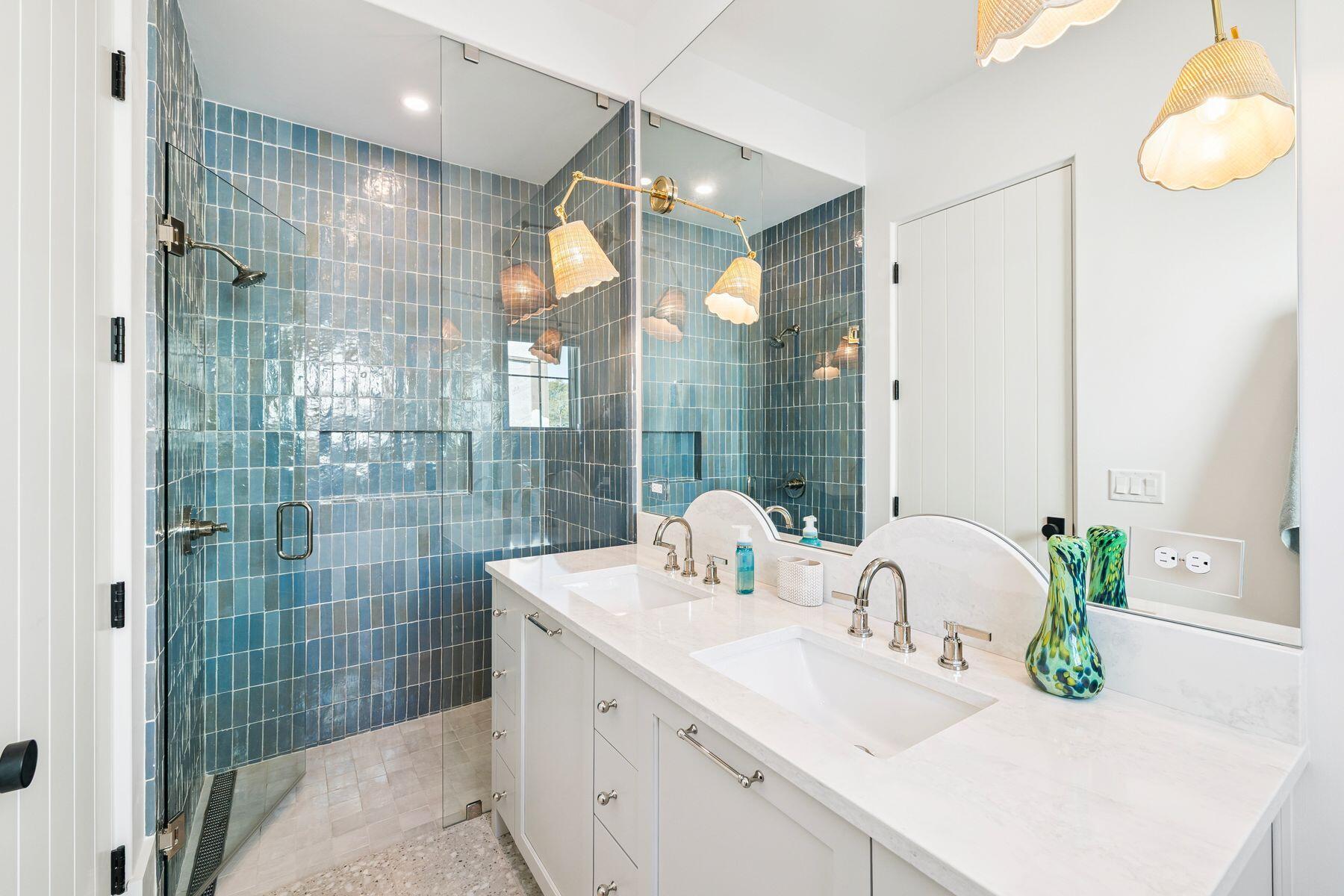 215 Dogwood Street Santa Rosa Beach, FL 32459 - Photo 66 of 91 a bathroom with a double vanity sink mirror and shower
