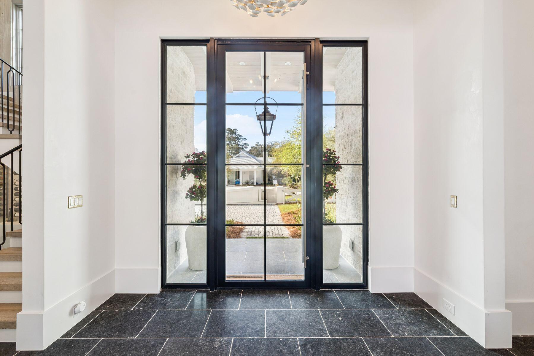 215 Dogwood Street Santa Rosa Beach, FL 32459 - Photo 10 of 91 a view of a glass entrance door