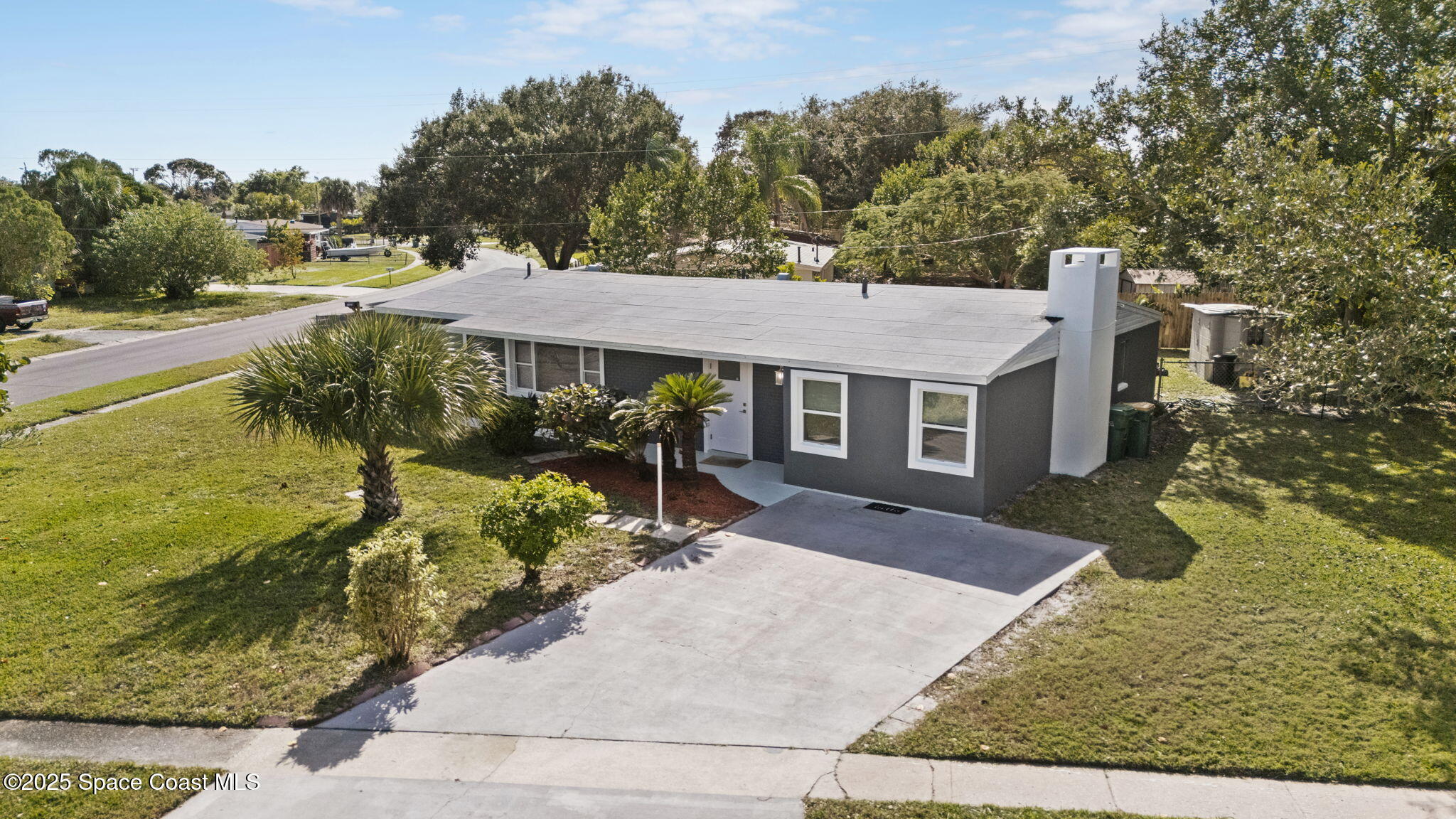 2033 Adams Avenue Melbourne, FL 32935 - Photo 1 of 29 3-web-or-mls-ADAMS_DRONE4