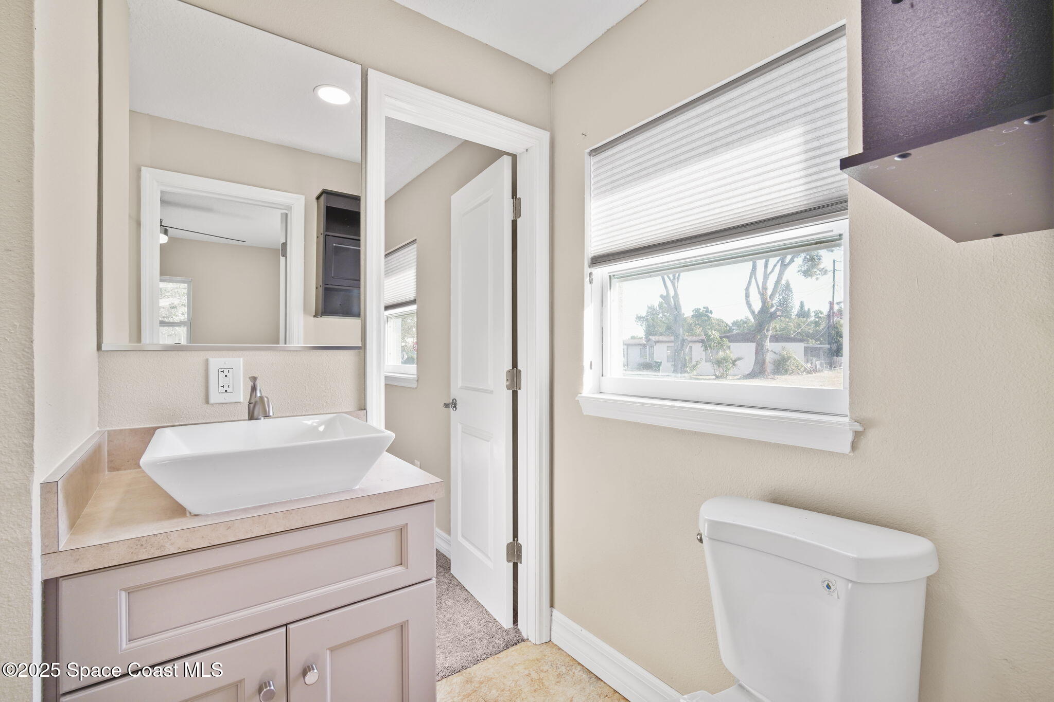 2033 Adams Avenue Melbourne, FL 32935 - Photo 13 of 29 23-web-or-mls-ADAMS_BATHROOM3
