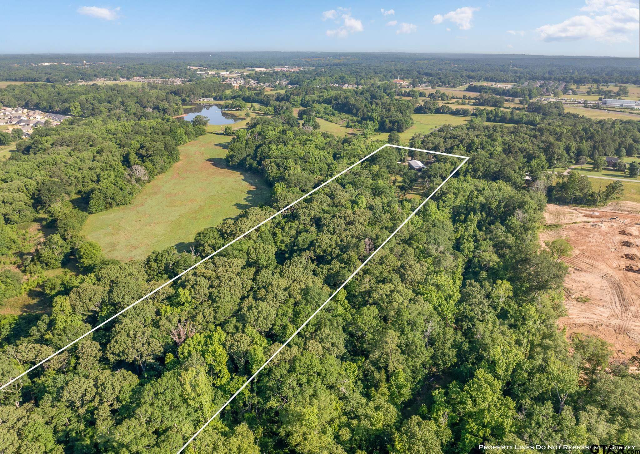 1428 Hagan Road Whitehouse, TX 75791 - Photo 27 of 37 an aerial view of residential houses with outdoor space and river