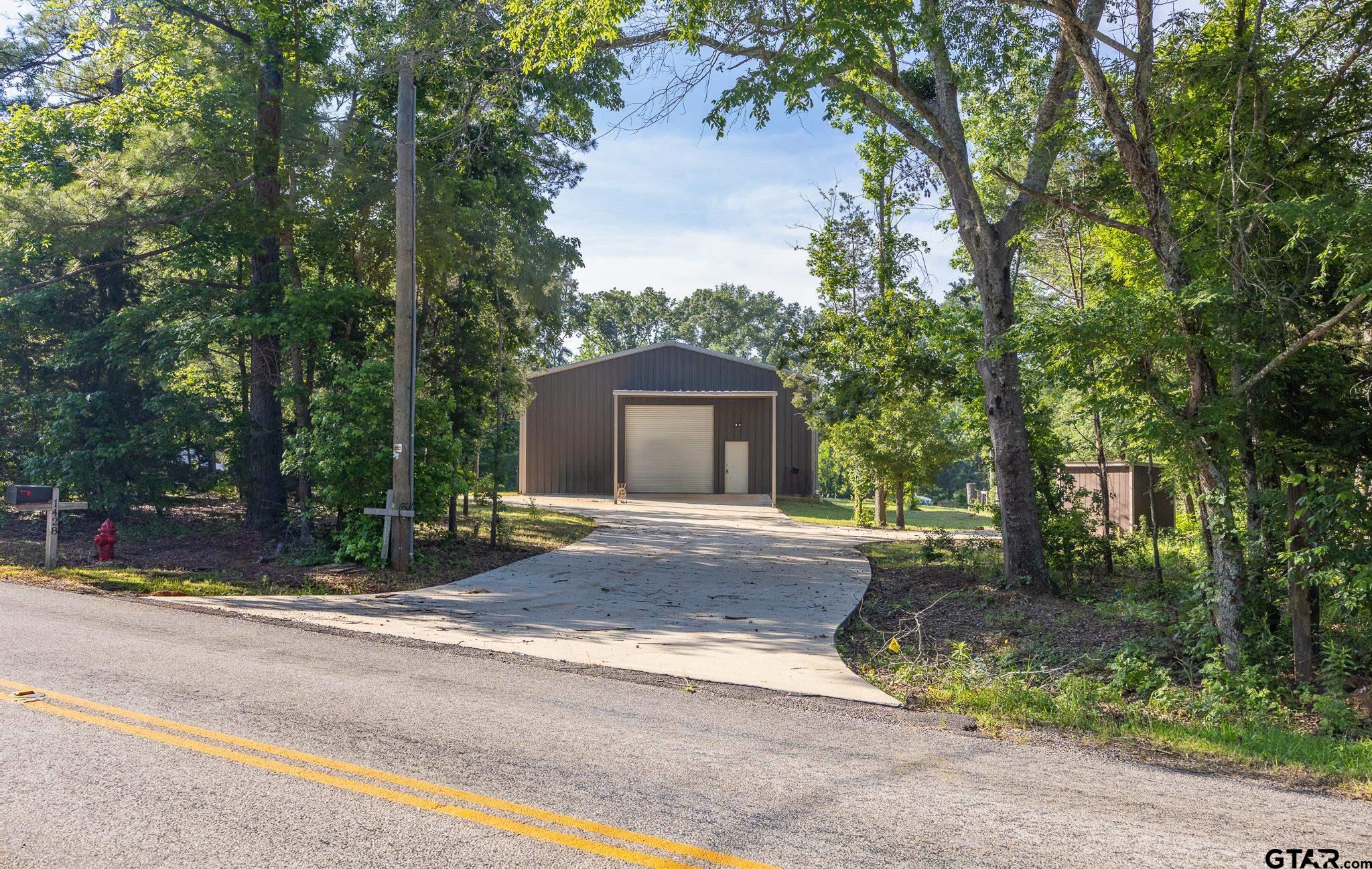 1428 Hagan Road Whitehouse, TX 75791 - Photo 36 of 37 a view of a house with a yard and tree s