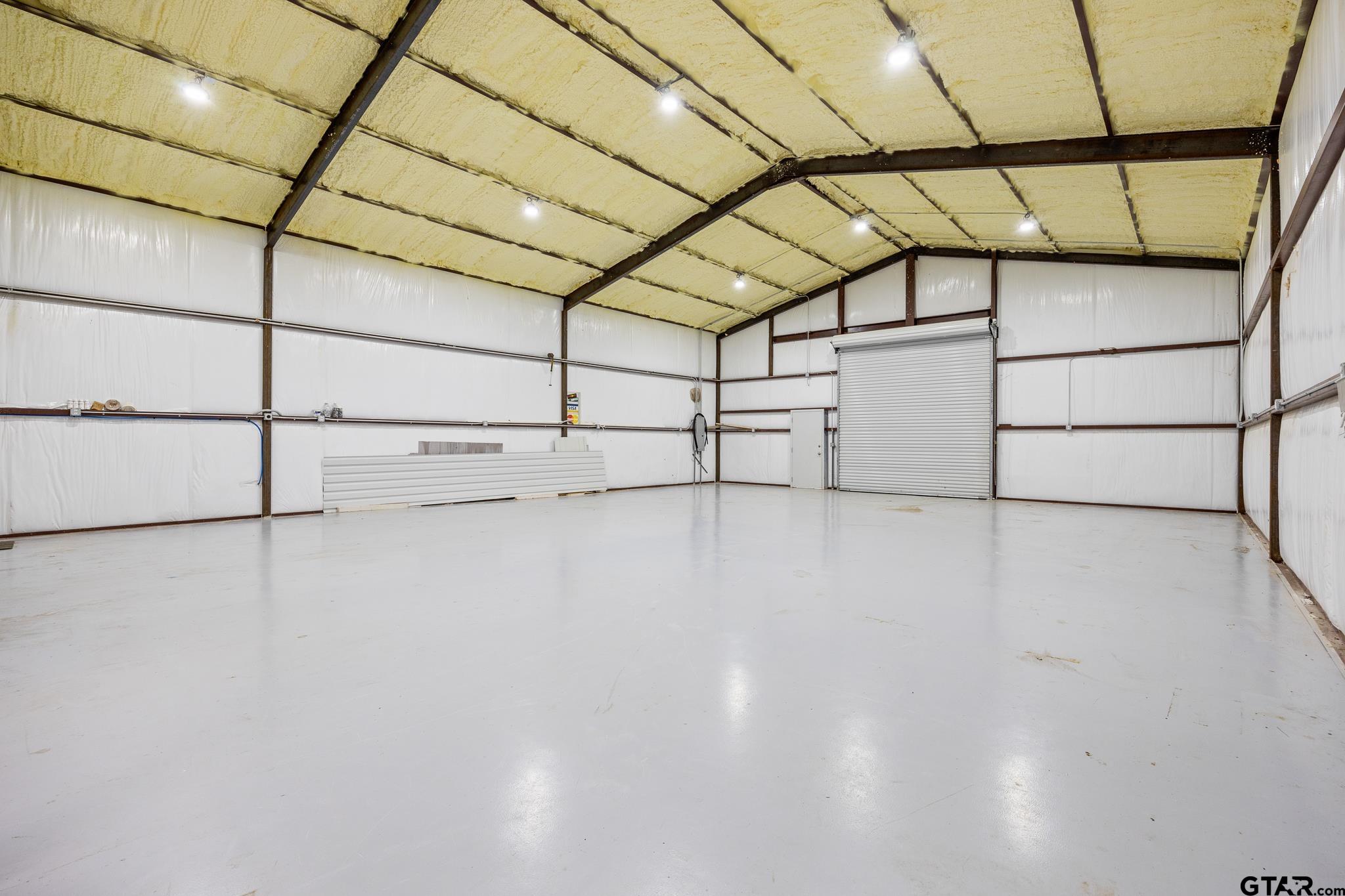 1428 Hagan Road Whitehouse, TX 75791 - Photo 4 of 37 a view of a indoor garage