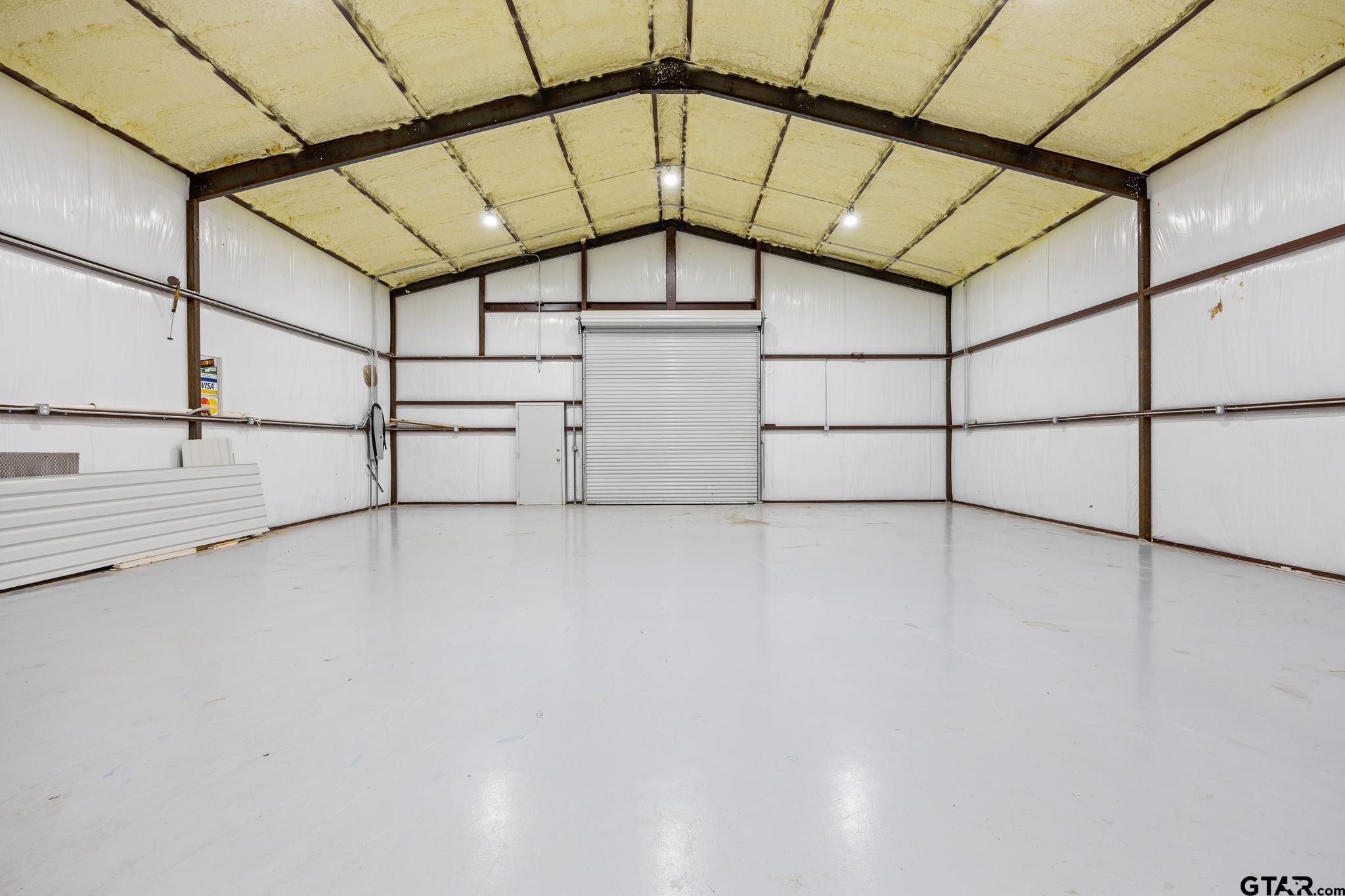 1428 Hagan Road Whitehouse, TX 75791 - Photo 7 of 37 a view of a indoor garage