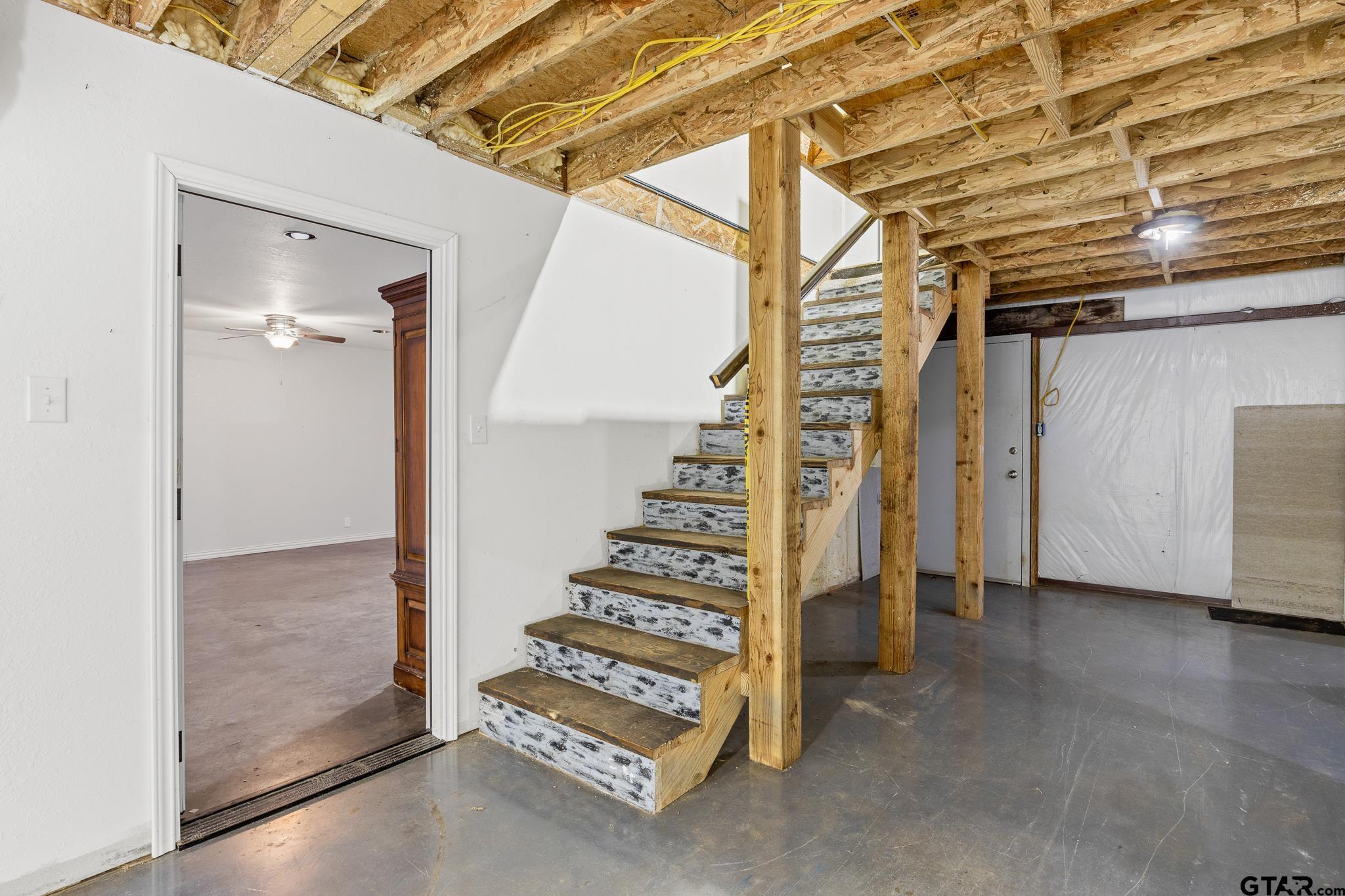 1428 Hagan Road Whitehouse, TX 75791 - Photo 8 of 37 a view of an empty room with stairs and ventilation