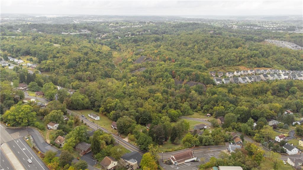 Parcel Id# 0205-d28900000 Moon Run Road McKees Rocks, PA 15136 - Photo 3 of 16 a view of a city with lush green forest