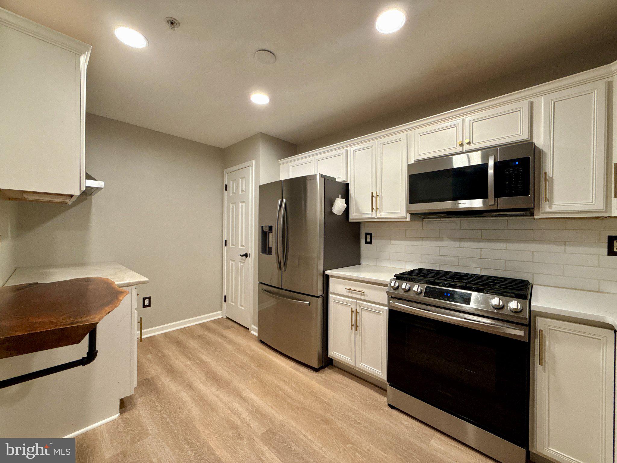 267 Flagstone Road, Unit 6 Chester Springs, PA 19425 - Photo 9 of 27 Modern kitchen with sleek finishes.