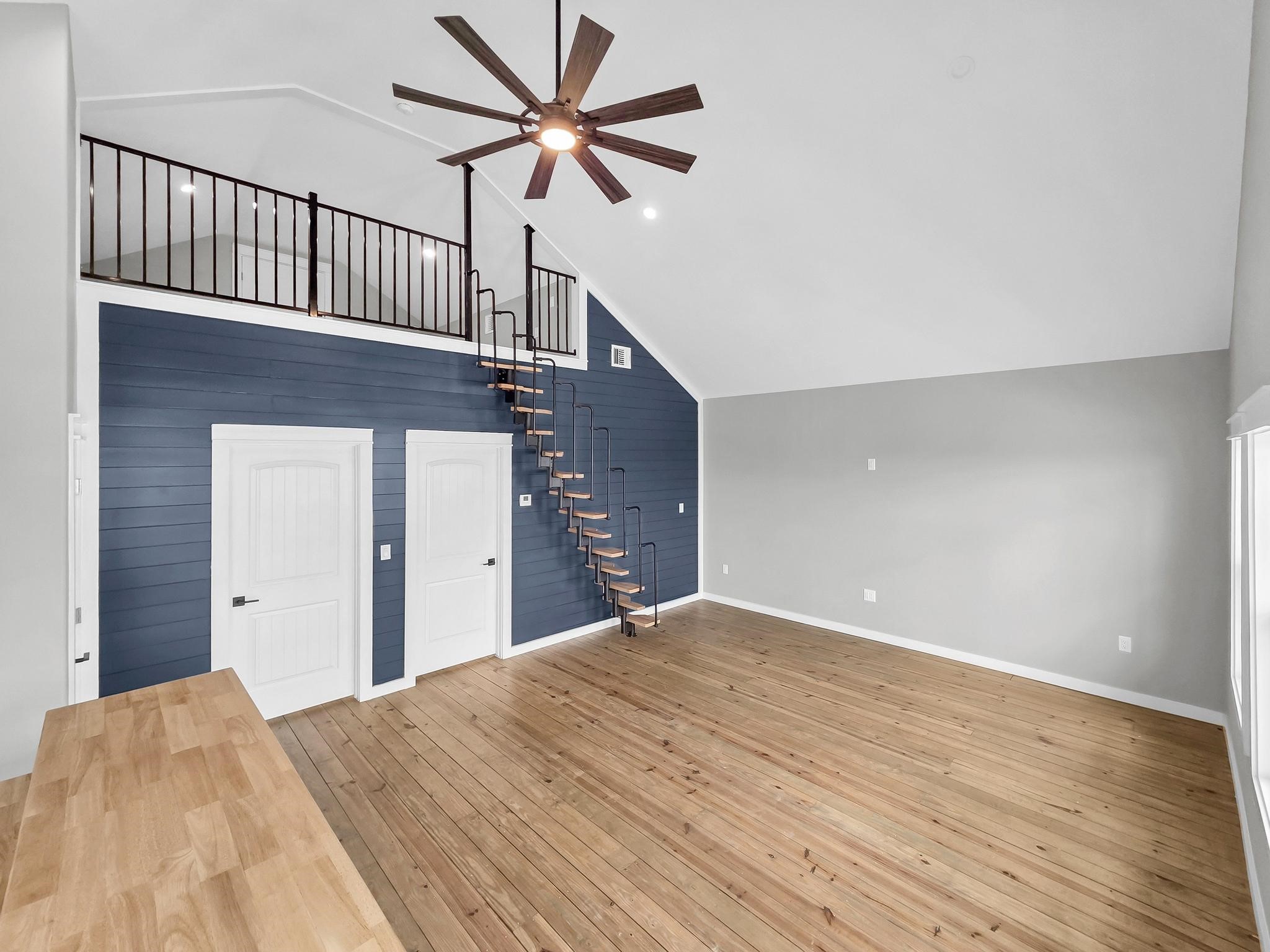 1041 Sunset Circle Crystal Beach, TX 77650 - Photo 14 of 45 a view of a big room with wooden floor