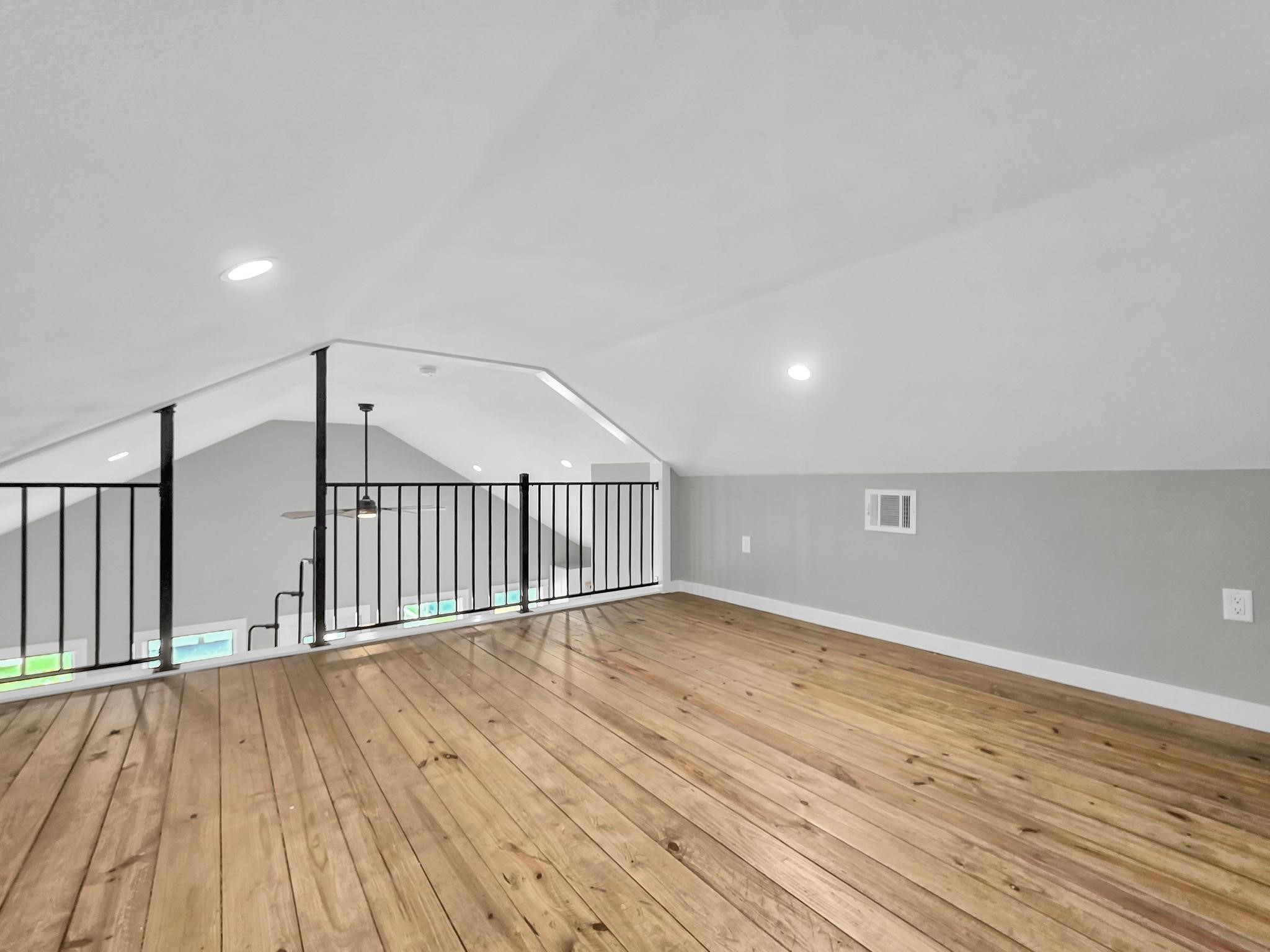1041 Sunset Circle Crystal Beach, TX 77650 - Photo 24 of 45 a view of a hallway with wooden floor