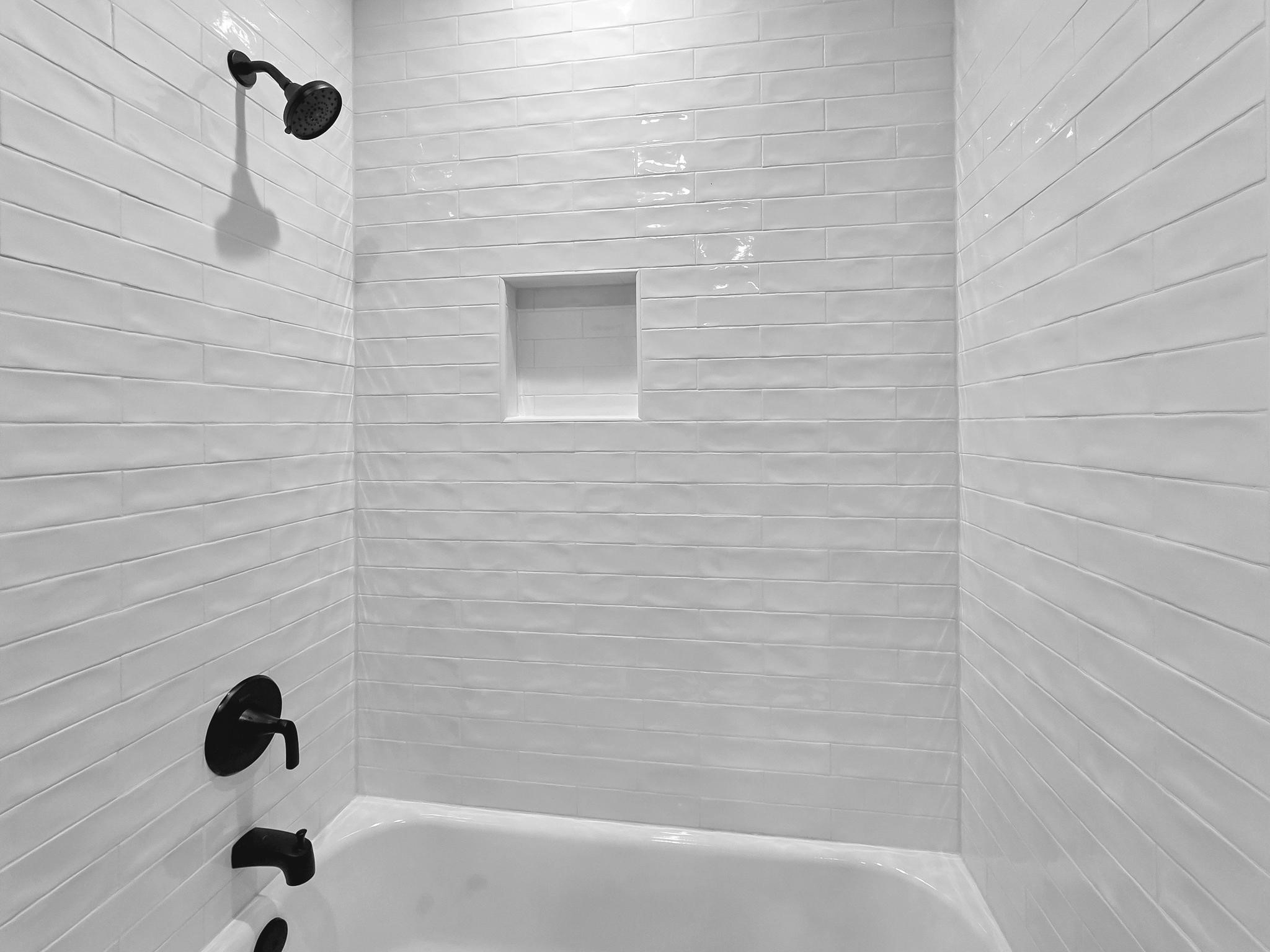 1041 Sunset Circle Crystal Beach, TX 77650 - Photo 29 of 45 a bathroom with a shower