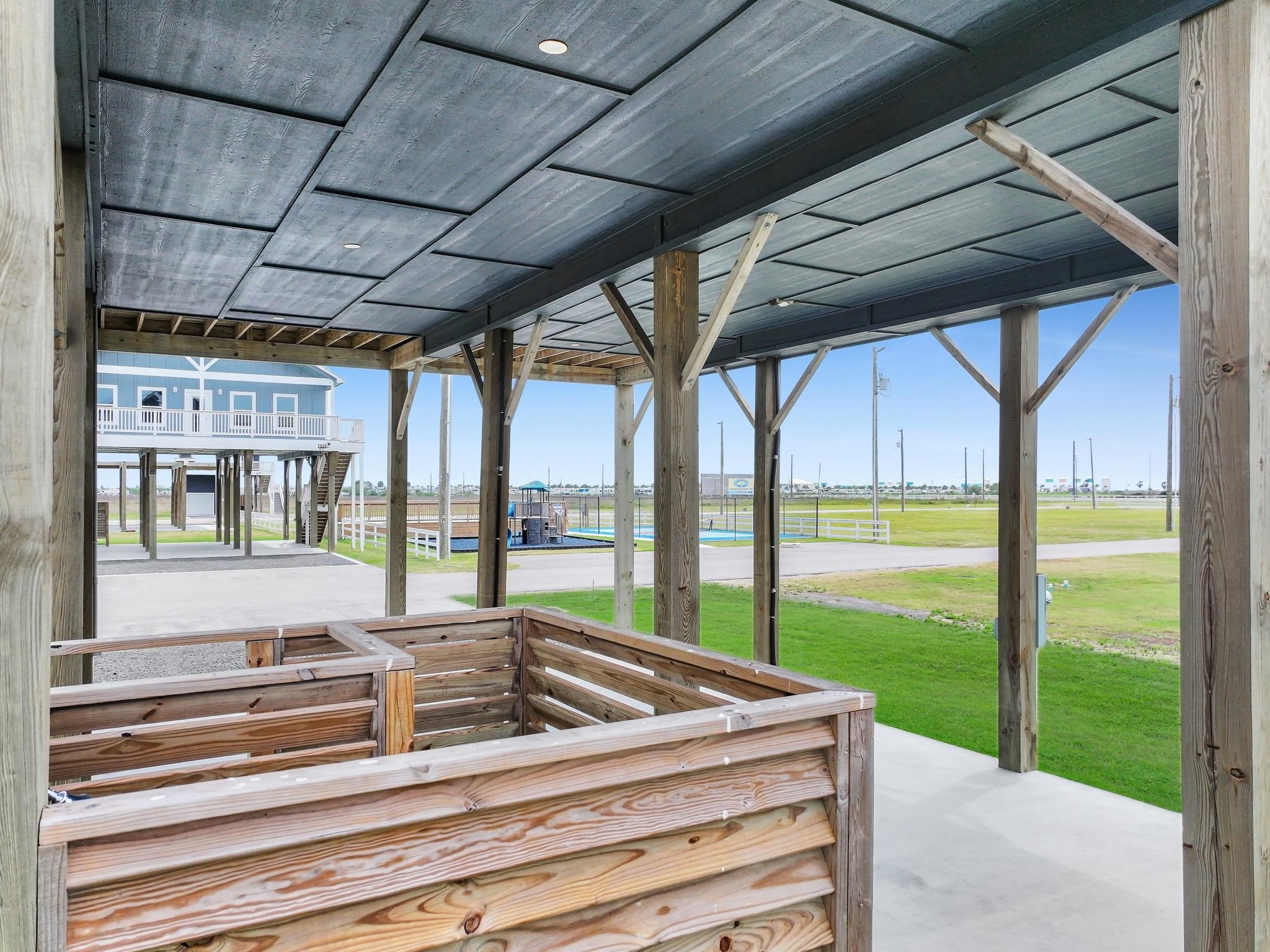 1041 Sunset Circle Crystal Beach, TX 77650 - Photo 43 of 45 a view of outdoor space and deck