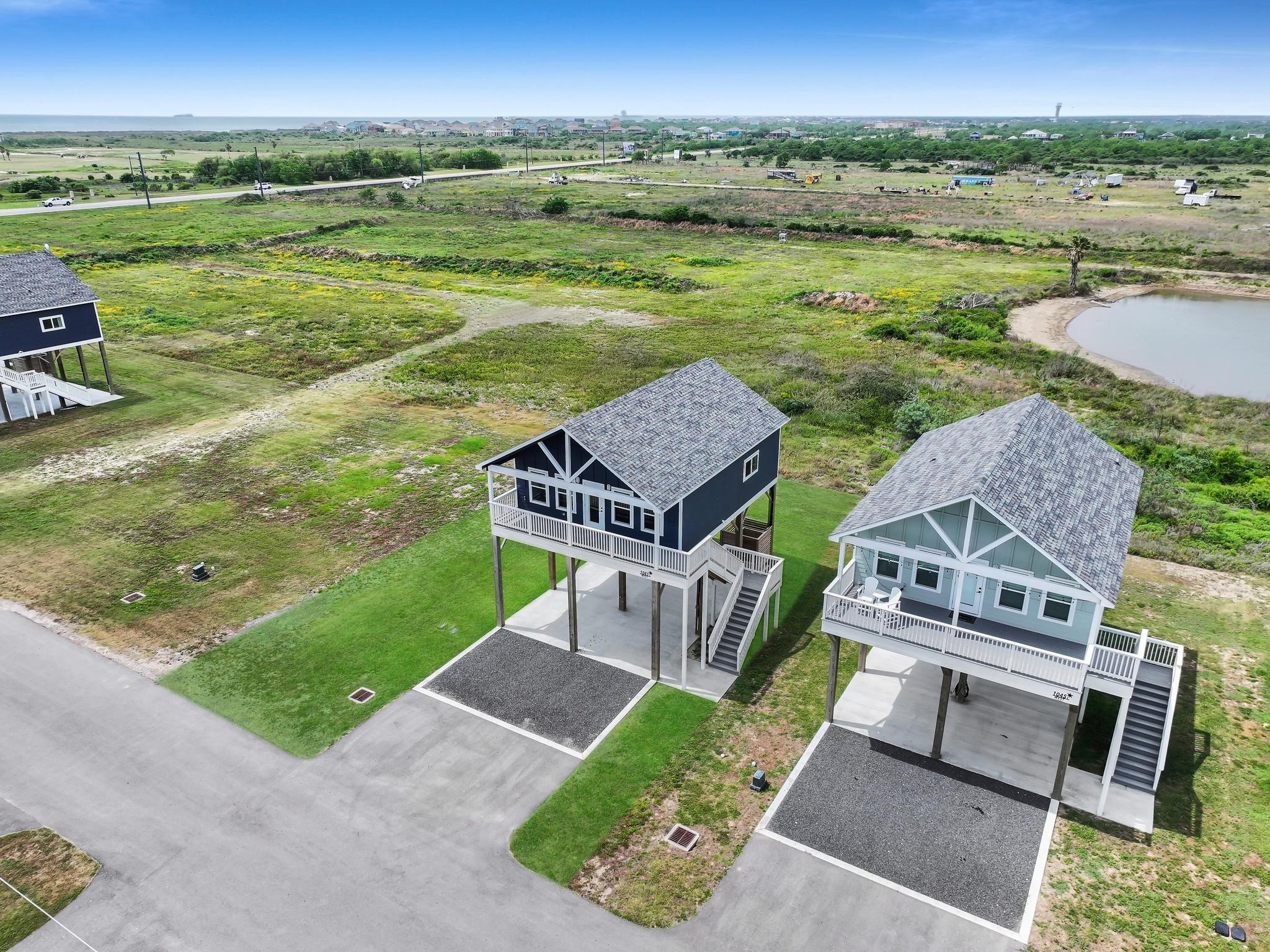 1041 Sunset Circle Crystal Beach, TX 77650 - Photo 8 of 45 an aerial view of a house with big yard