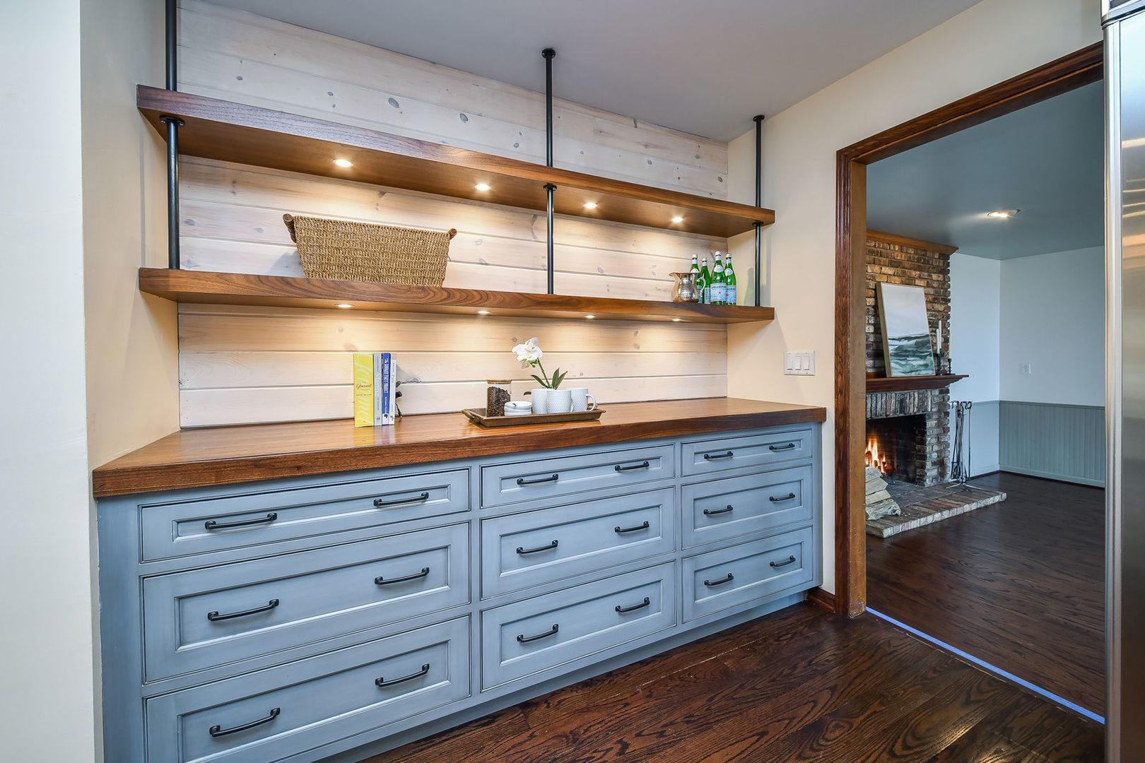 42W420 Campton Hills Road Elburn, IL 60119 - Photo 15 of 58 a kitchen with granite countertop white cabinets and wooden floor