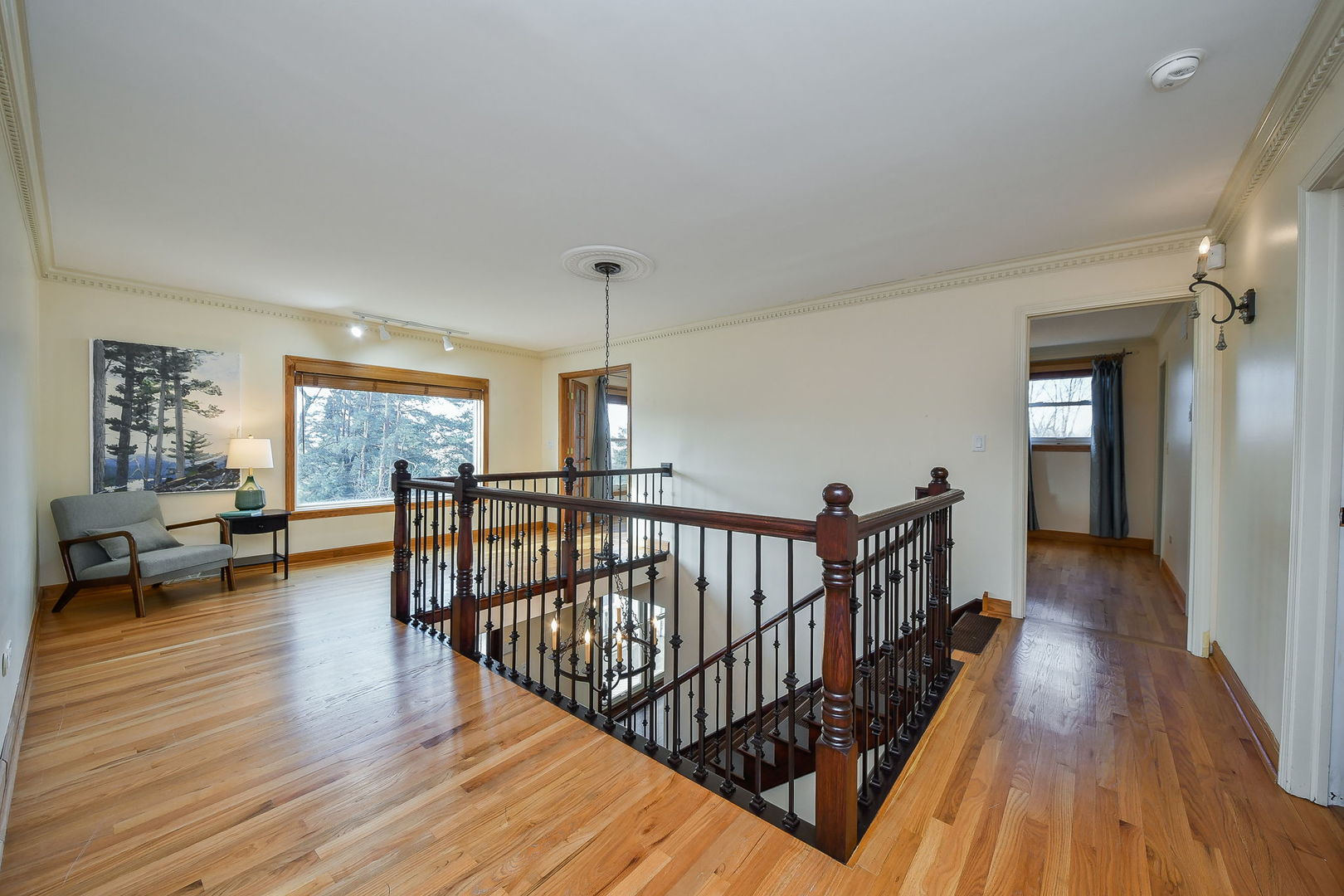 42W420 Campton Hills Road Elburn, IL 60119 - Photo 21 of 58 a view of gallery with wooden floor and stairs