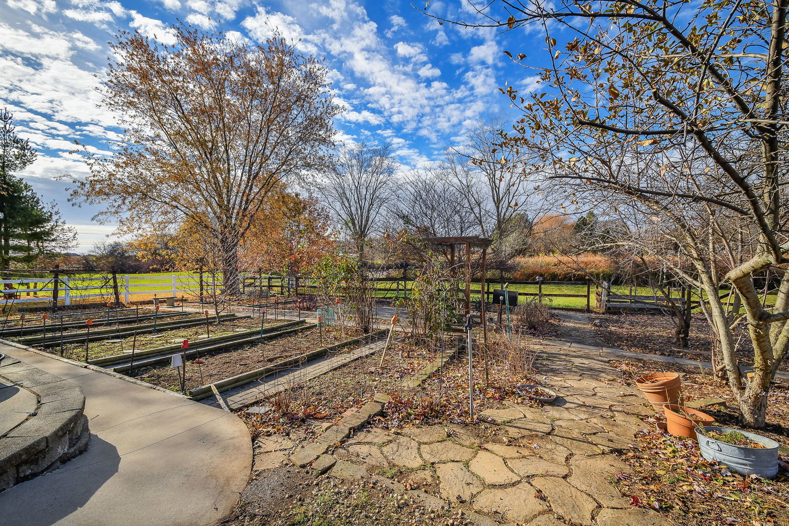 42W420 Campton Hills Road Elburn, IL 60119 - Photo 51 of 58 a view of a yard with wooden fence