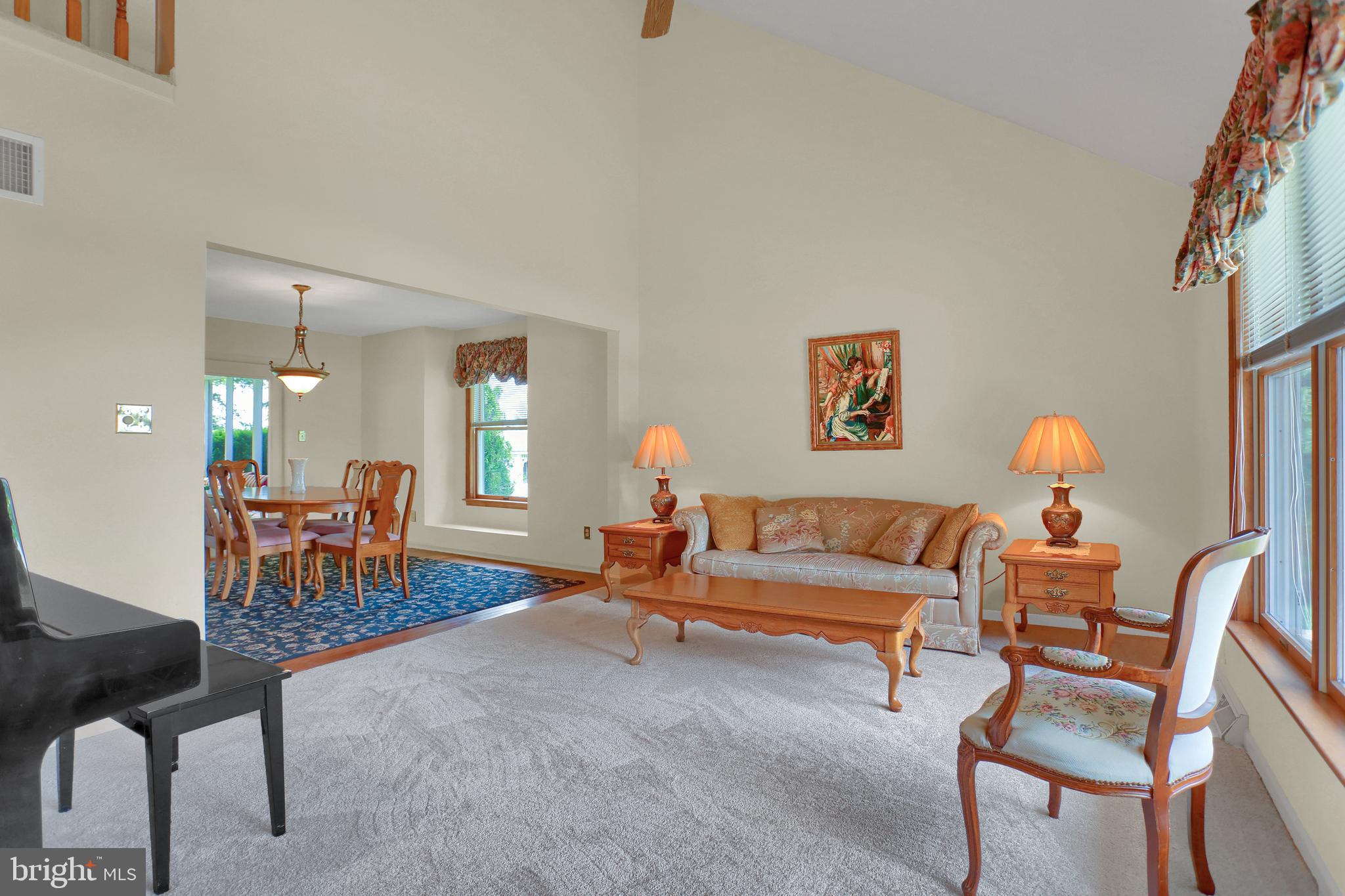 116 Abbey Road New Freedom, PA 17349 - Photo 8 of 35 Vaulted ceiling magnifies this large living room