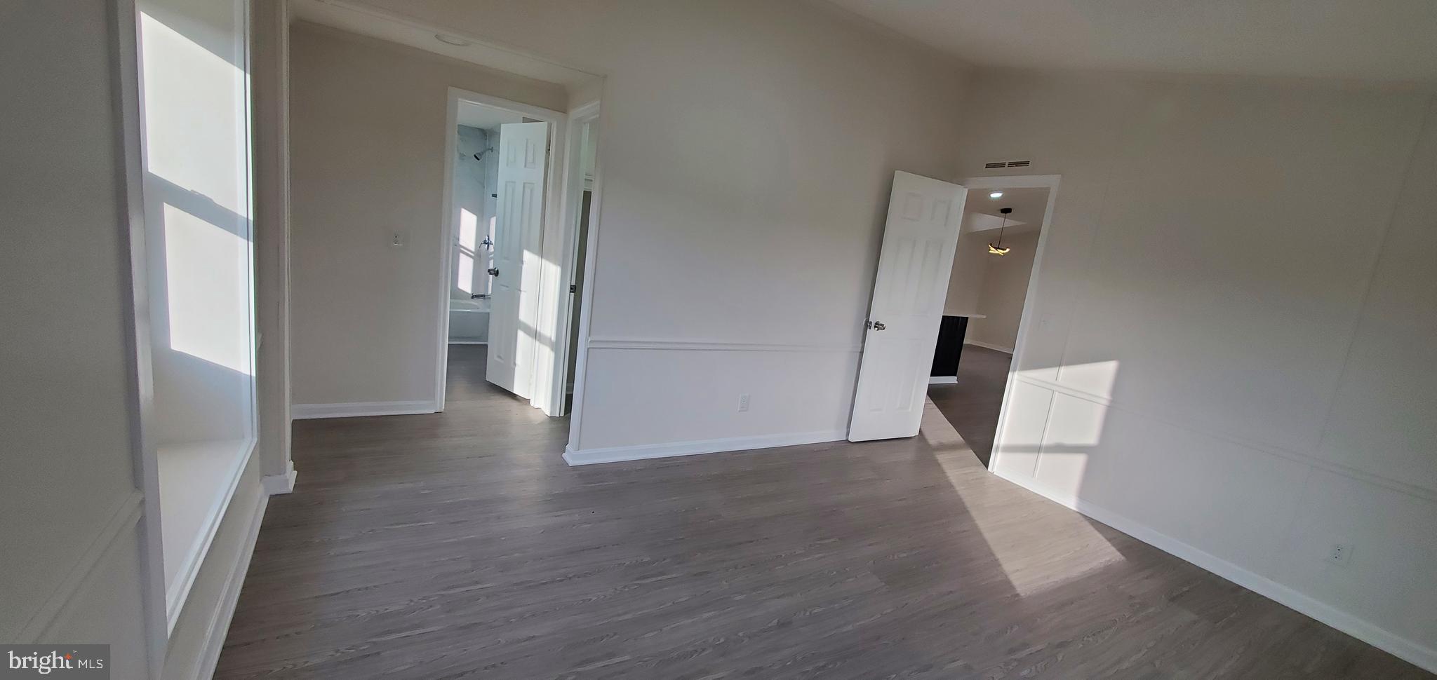 35-1125 Old Philadelphia Road Aberdeen, MD 21001 - Photo 11 of 18 a view of a hallway with wooden floor