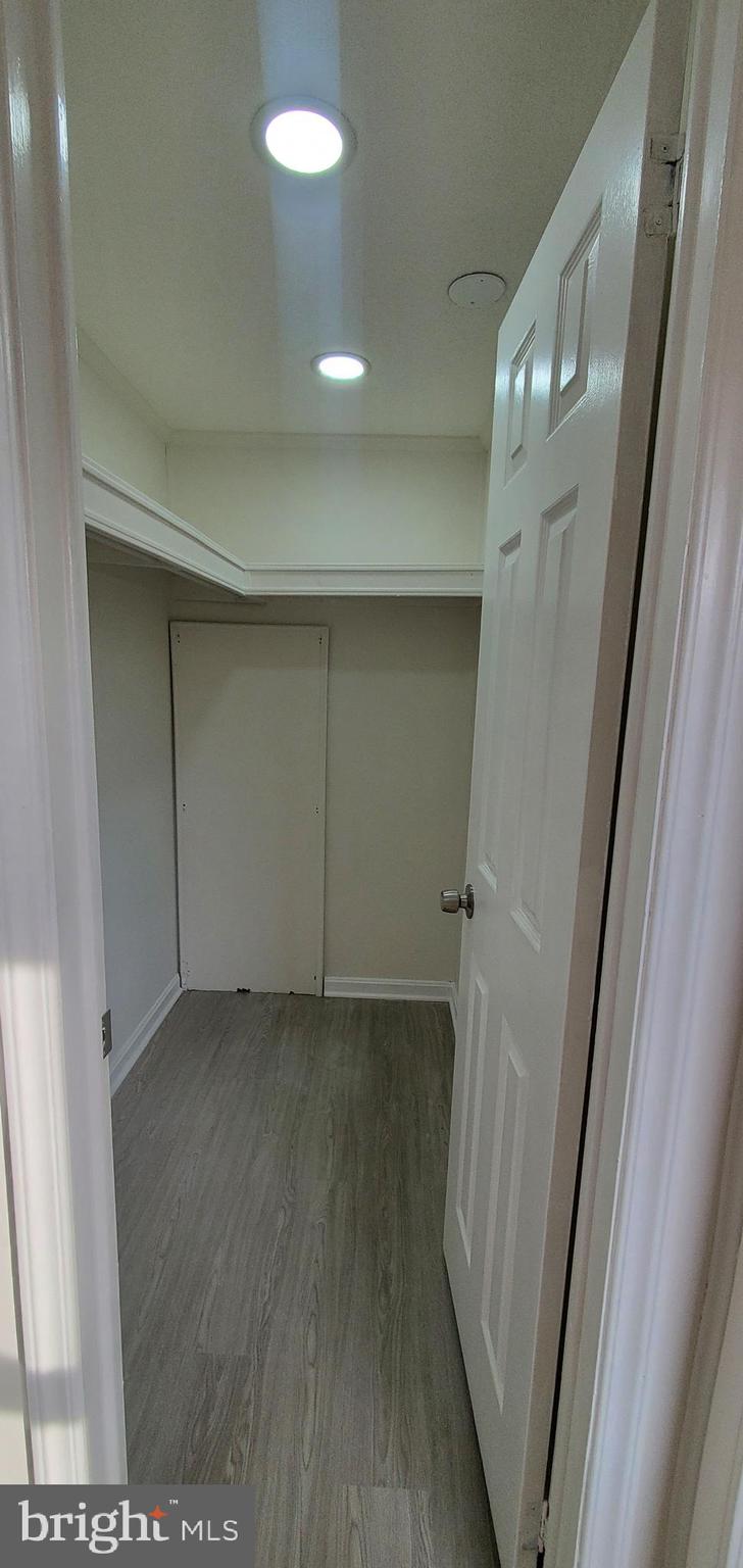 35-1125 Old Philadelphia Road Aberdeen, MD 21001 - Photo 12 of 18 a view of hallway with wooden floor