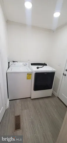 a utility room with a washer and dryer