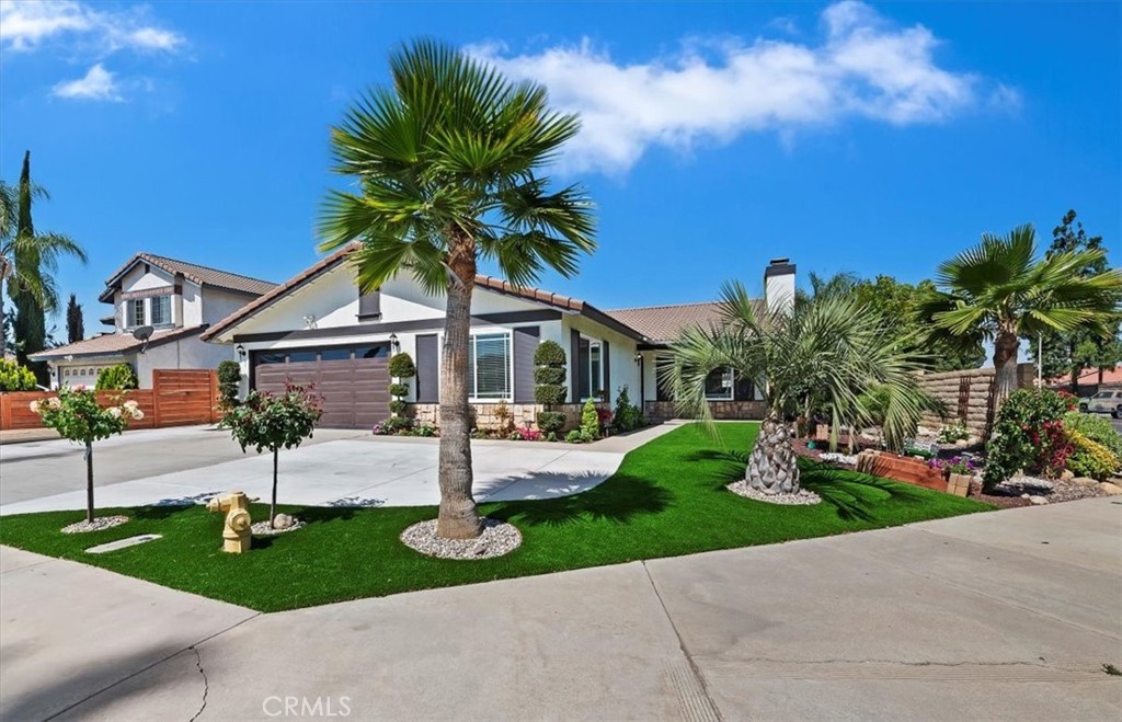 14509 Rio Bravo Road Moreno Valley, CA 92553 - Photo 1 of 1 a front view of house with yard and green space