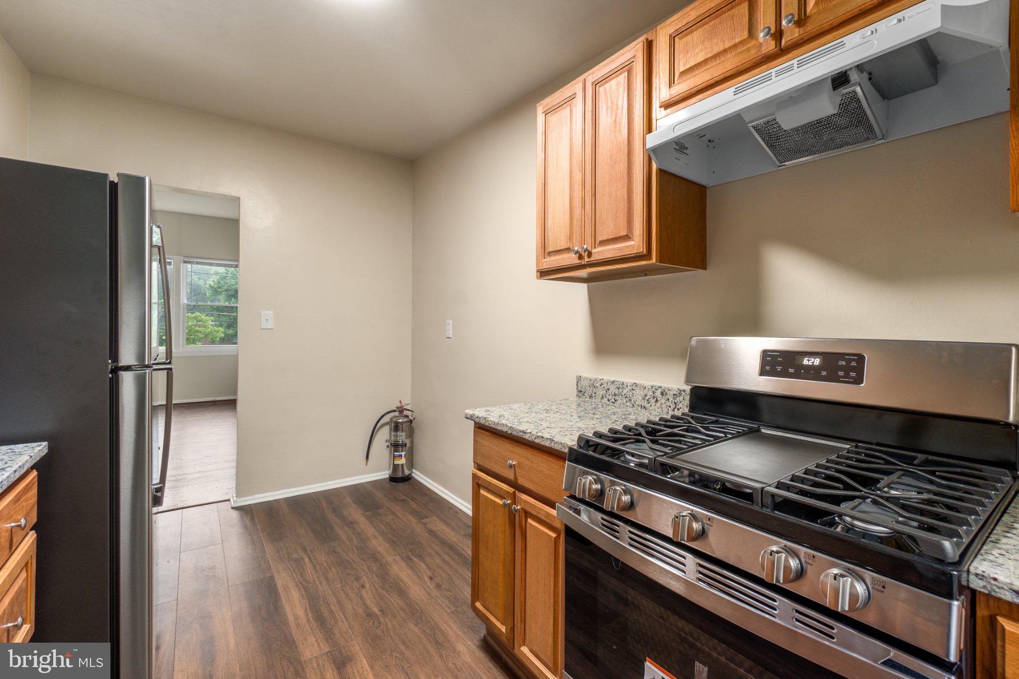 1029 Quebec Terrace, Unit 8 Silver Spring, MD 20903 - Photo 8 of 21 Modern kitchen with sleek finishes.