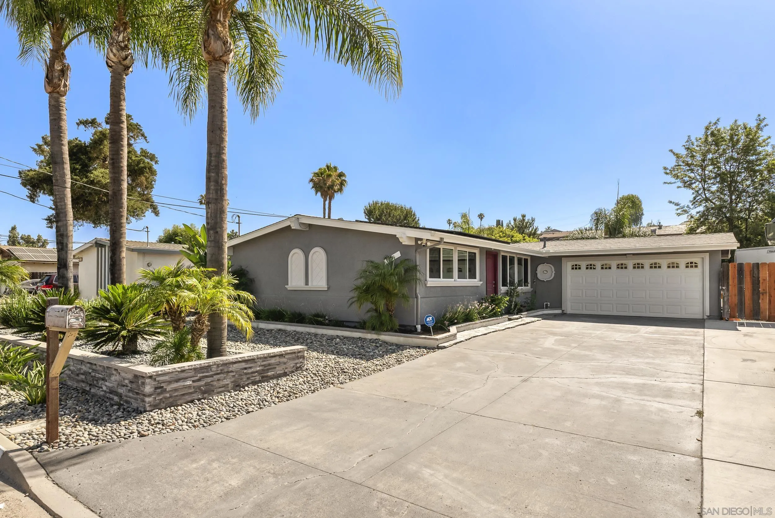 13425 Powers Road Poway, CA 92064 - Photo 3 of 35 a view of a house with a backyard