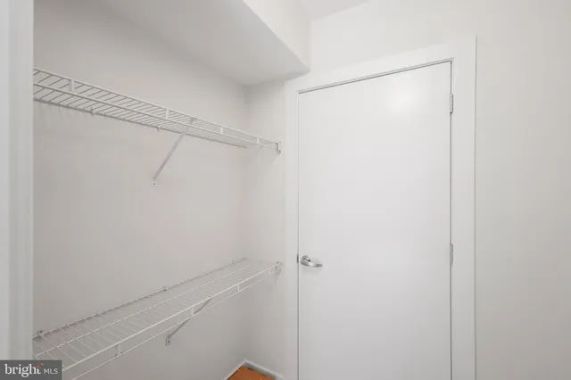 a view of a room with racks on the wall