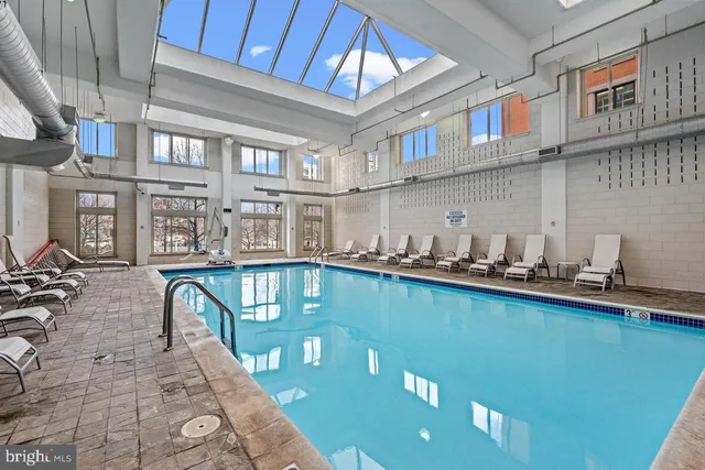a view of a living room and kitchen