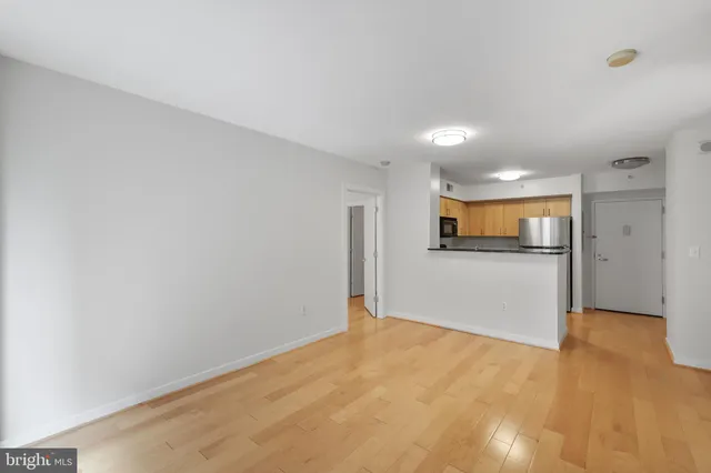 a view of a kitchen with a sink