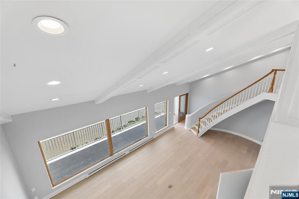 1225 River Road, Unit 4D Edgewater, NJ 07020 - Photo 24 of 47 a view of an empty room with stairs